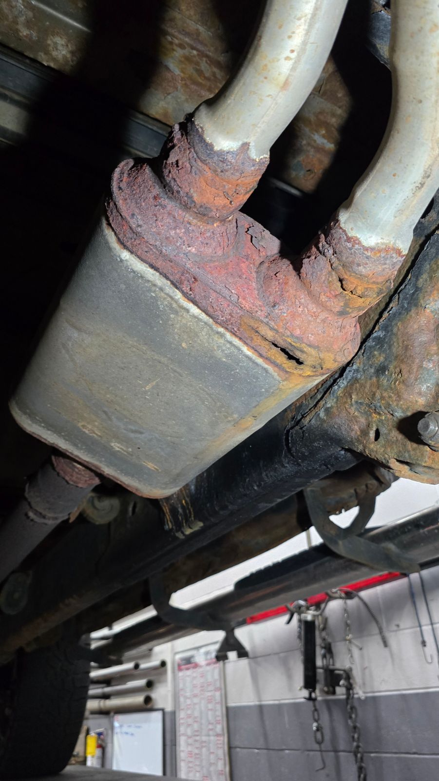 Rear muffler leaking exhaust through a hole