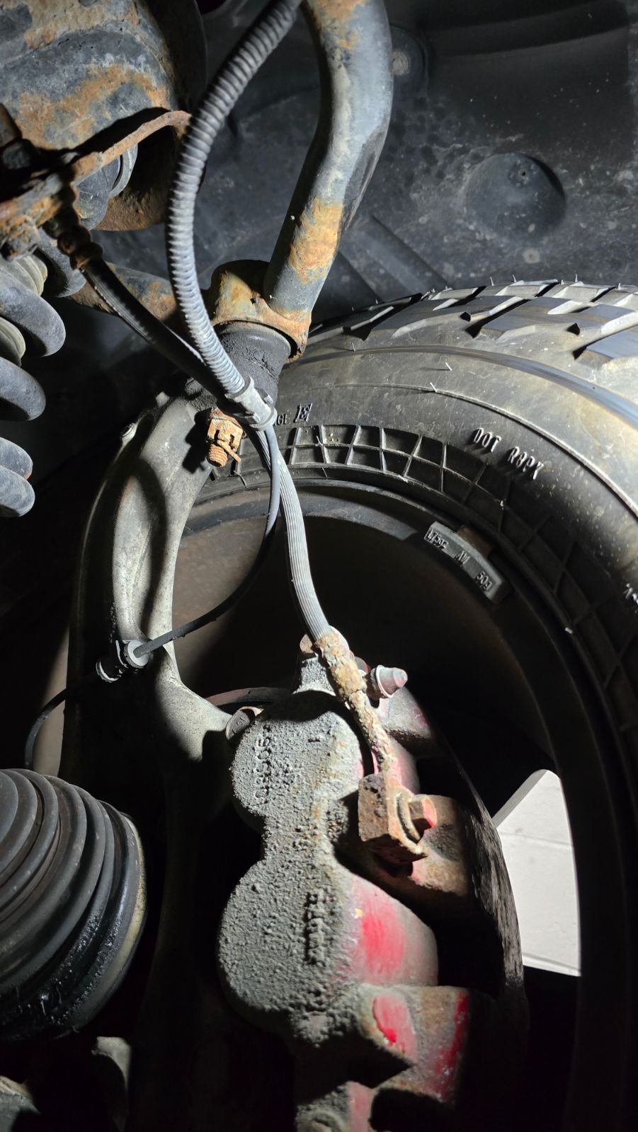 Right front upper control arm rubbing on the wheel