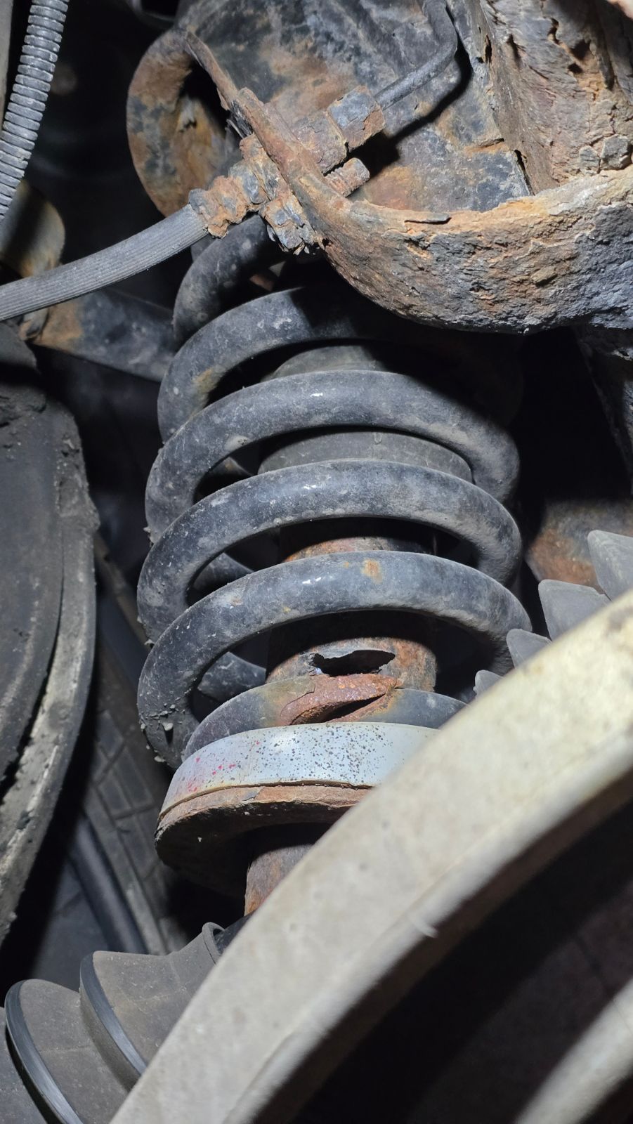 Broken front coil spring